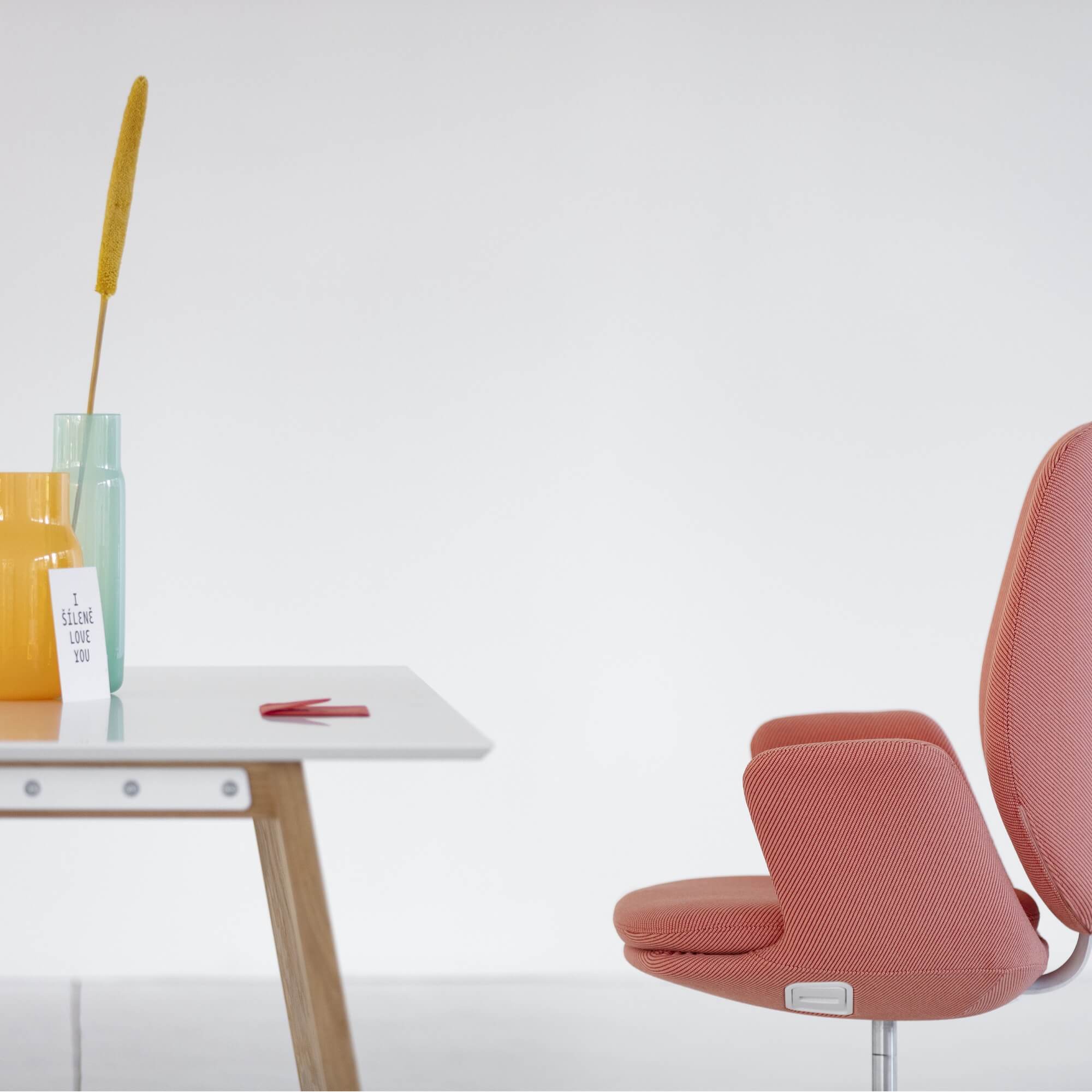 Office desk chairs executive chairs and conference chairs modern conference chair white frame and coral fabric workspace view 1